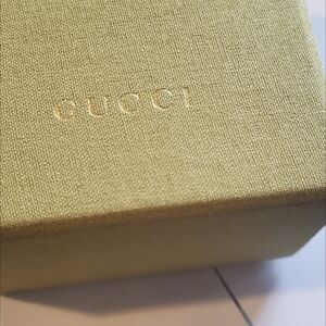 Gucci Elegant Gold Box with White Ribbon